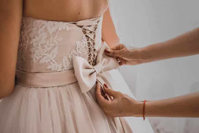 the back of the bride in a wedding dress